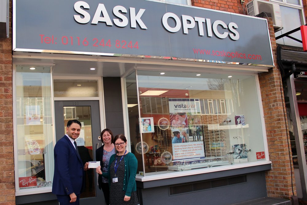 A picture of the team outside Sask Optics.