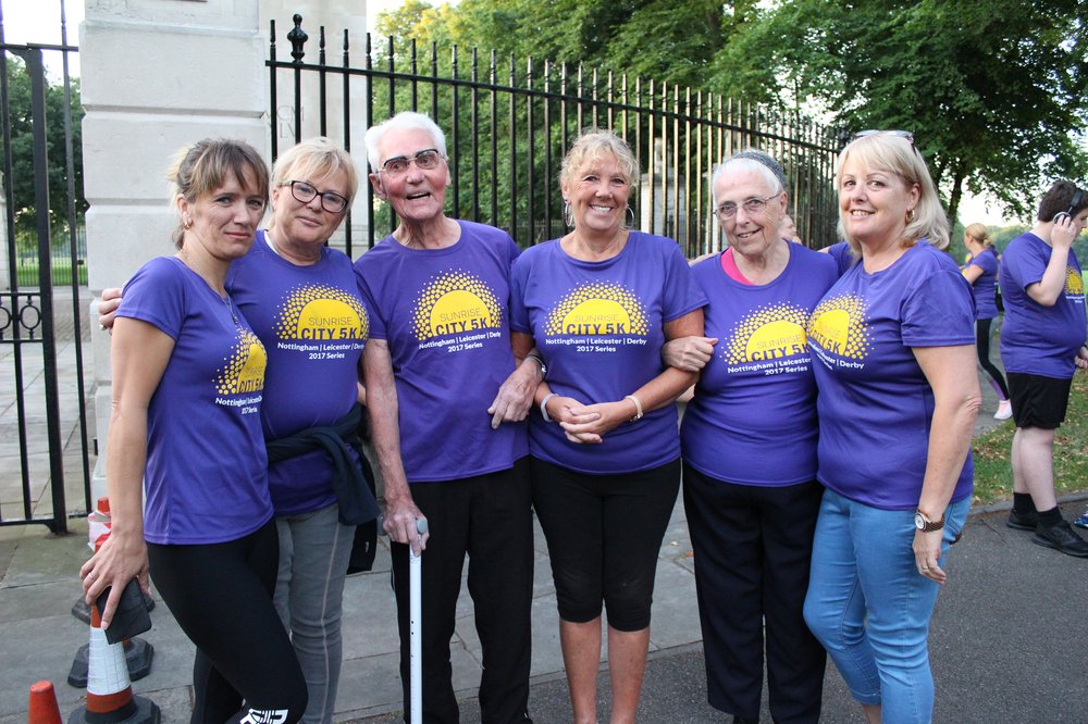 A picture of Julie Rudd, New Wycliffe Home's Manager, with employees and residents.