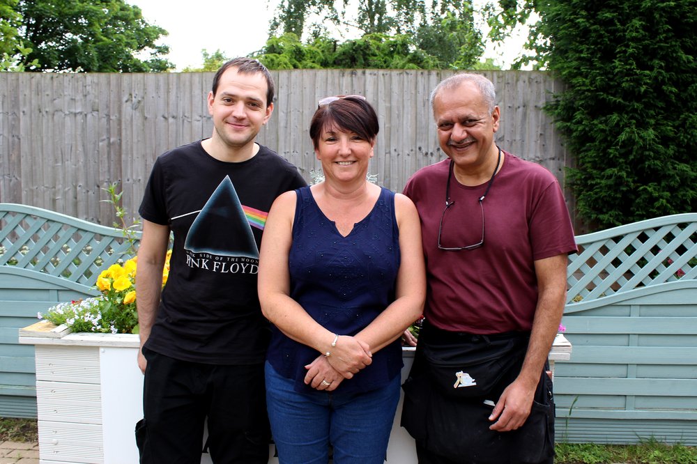 A picture of Max and colleagues in Kathleen Rutland Home's garden.