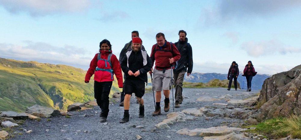A picture of people trekking on the Three Peaks Challenge.
