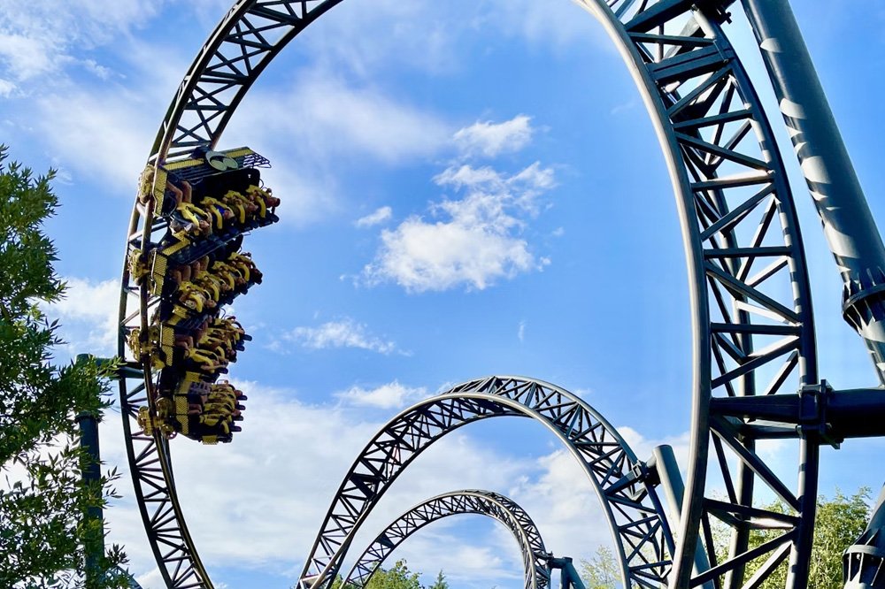 Image of a Rollercoaster Corkscrew at Alton Towers with a cart going along the track.
