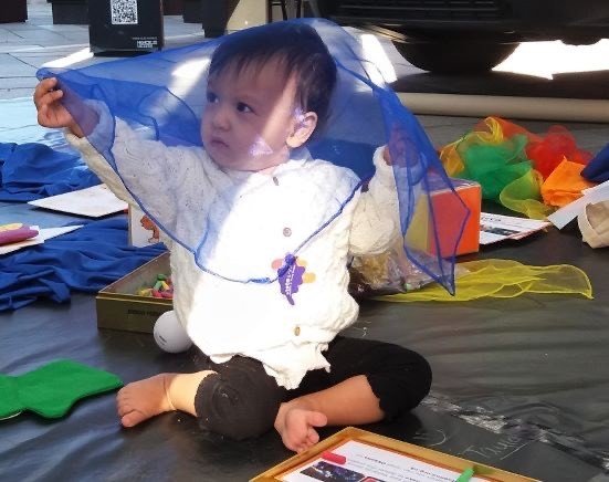 photo-of-child-sitting-at-desk-on-early-years-programme