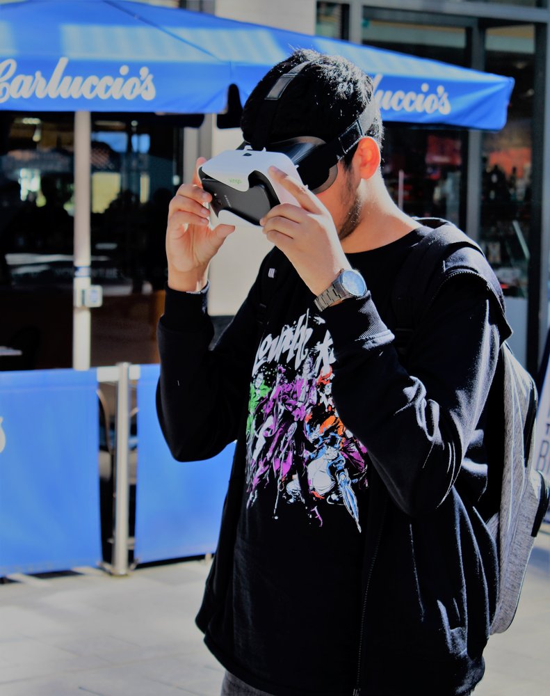 Man using our VR goggles to experience eye conditions