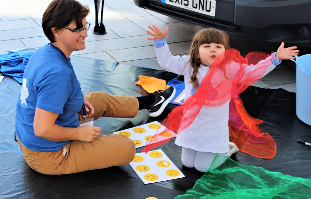 A child playing with the early years pack