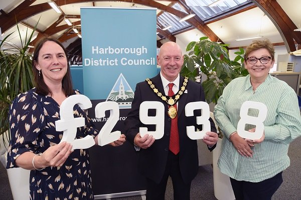 Chairman Stephen Bilbie presents £2938.11 to from left, Kate Naish Director of Income Generation and Lisa Harrison-Bryne Income Generation Manager of Vista.