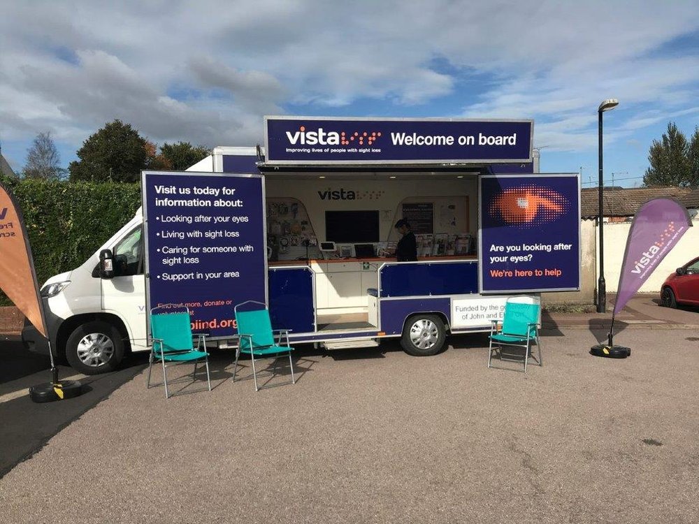 Image is of the exterior of our mobile support service bus exterior parked up outside in Shepshed.