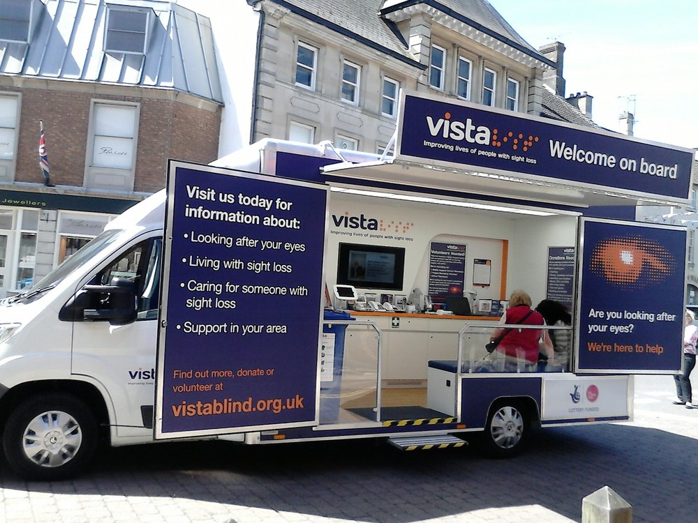 Image is of the exterior of Vista's mobile support service bus