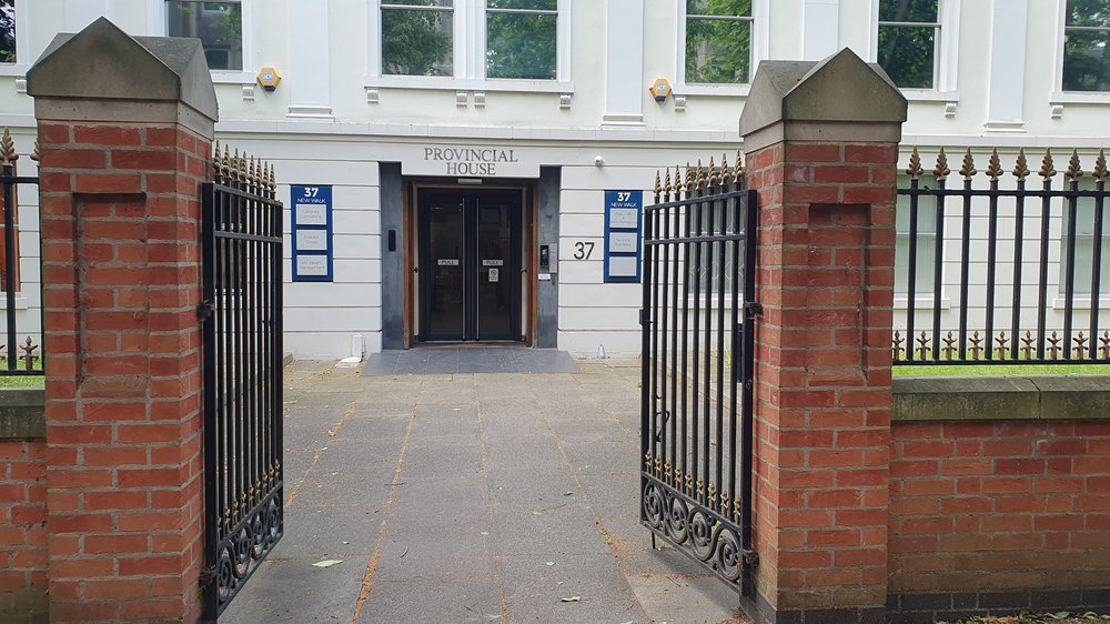 An exterior shot of a white building. 3rd Floor, Provincial House, 37 New Walk, Leicester, LE1 6TE.