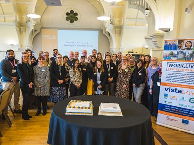 Staff, supporters and participants of the Work Live Leicestershire (WiLL) project pose for a team picture.